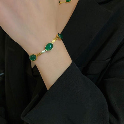 Emerald Glow™ Oval Green Stainless Crystal Pendant Necklace & Bracelet Set- Gold-Plated Elegance!!!