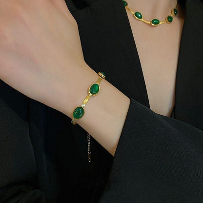 Emerald Glow™ Oval Green Stainless Crystal Pendant Necklace & Bracelet Set- Gold-Plated Elegance!!!